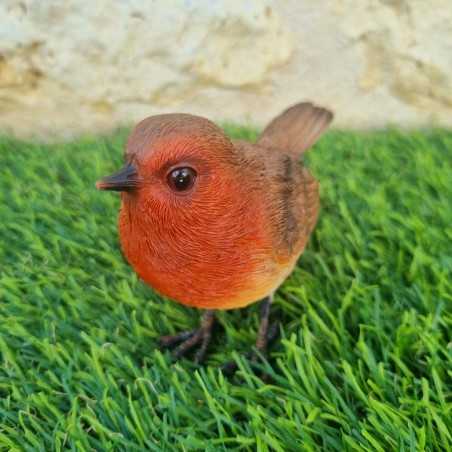 Uccello in resina rossa