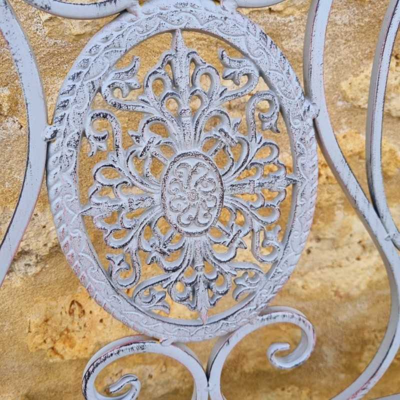 Banc en fer forgé et fonte 2 places patiné vue du détail en fonte